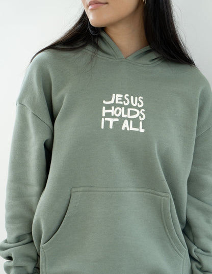 Elevated Faith Jesus Holds It All Unisex Hoodie - AVBL MRKT (7)