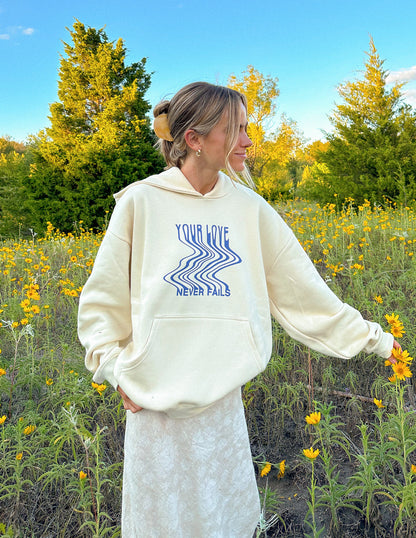 Elevated Faith Love Never Fails Cream Unisex Hoodie - AVBL MRKT (2)