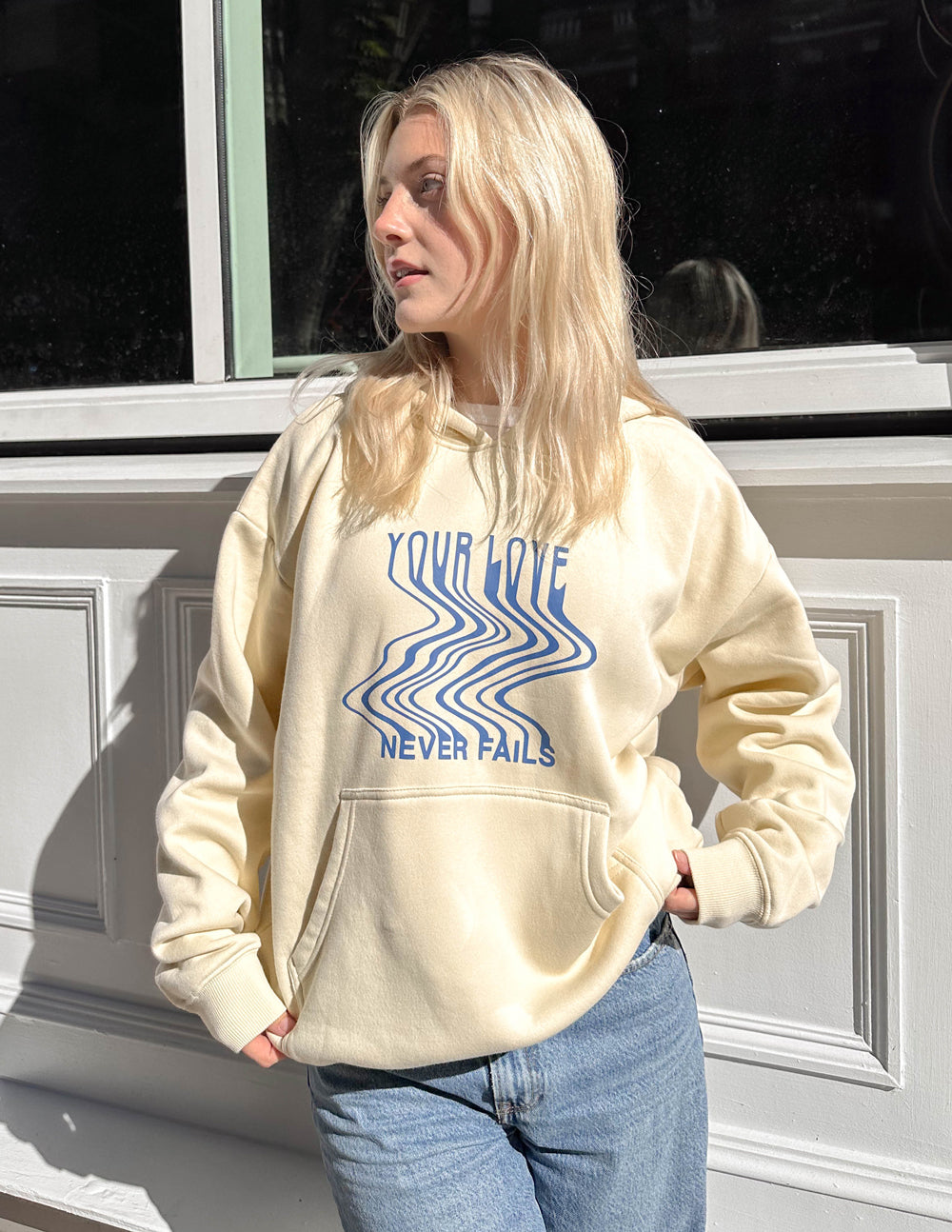 Elevated Faith Love Never Fails Cream Unisex Hoodie - AVBL MRKT (4)